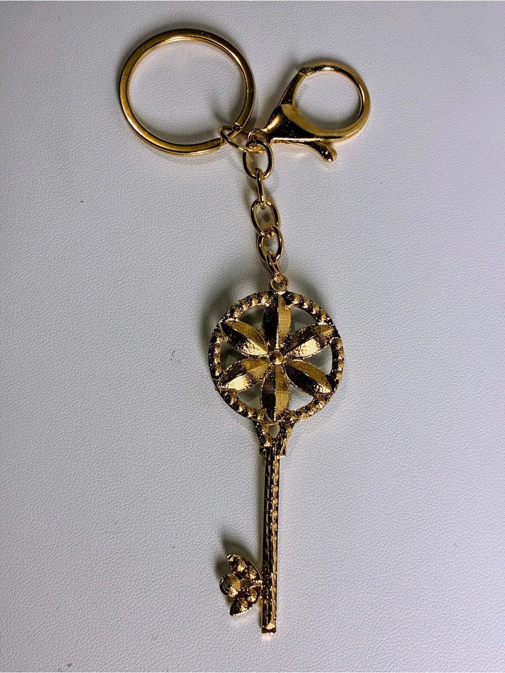 Gold Key Charm with Clear Crystal White Flower Petals New Without Tags
